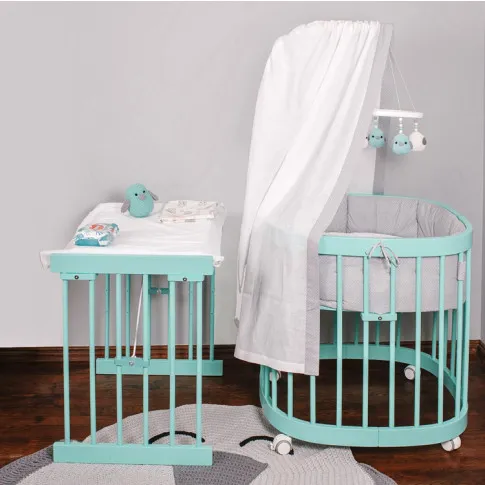 Aranżacja z miętowym wielofunkcyjnym łóżeczkiem dziecięcym Nando 5X