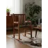 Fotel bujany z czarną poduszką Nevios