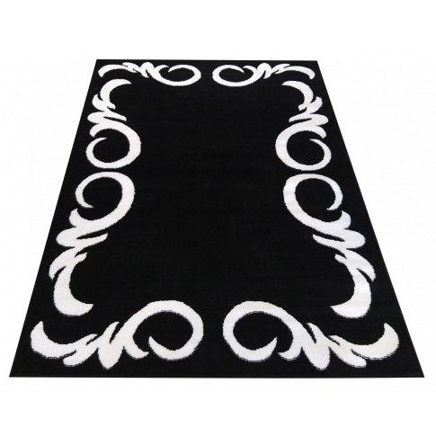Czarny prostokątny dywan z białym wzorem Bonix