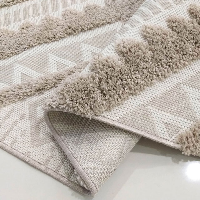 Beżowy nowoczesny dywan we wzory Romser