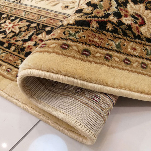 Kremowy owalny miękki dywan we wzory Marhal