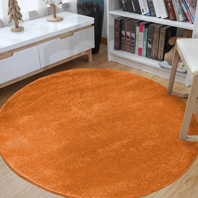 Pomarańczowy okrągły dywan do pokoju dziecięcego Bernis 3X