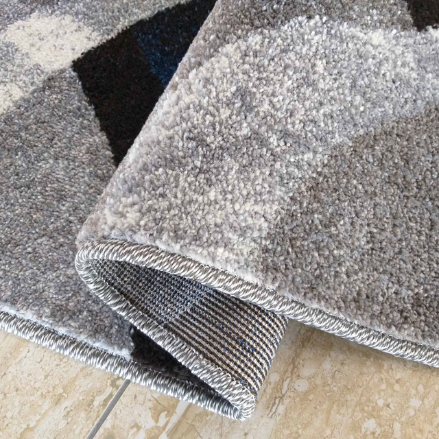 Szaro-turkusowy prostokątny dywan z wzorami Dravi