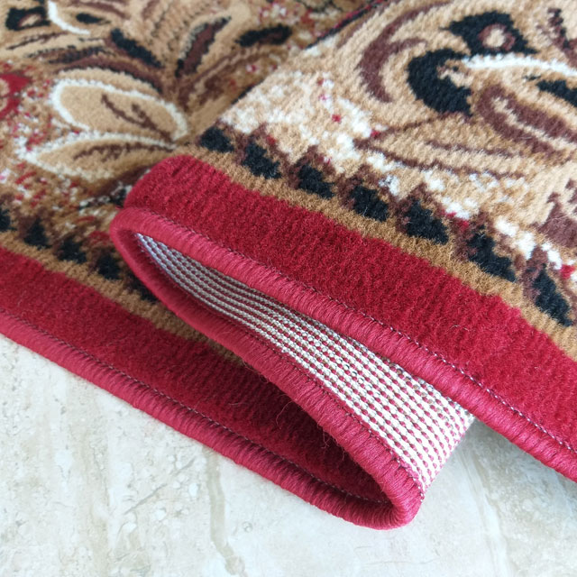 Czerwono-brązowy owalny dywan w kwiaty Malkon