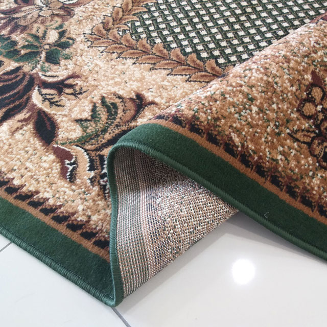 Brązowo-zielony owalny dywan w kwiaty Malkon