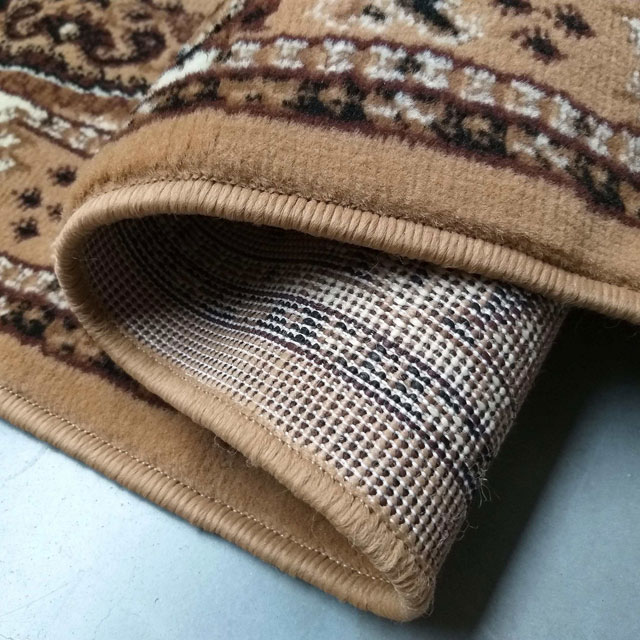 Brązowy owalny dywan rozeta Folto
