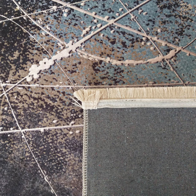 Nowoczesny dywan w abstrakcyjne wzory z frędzlami Kimas