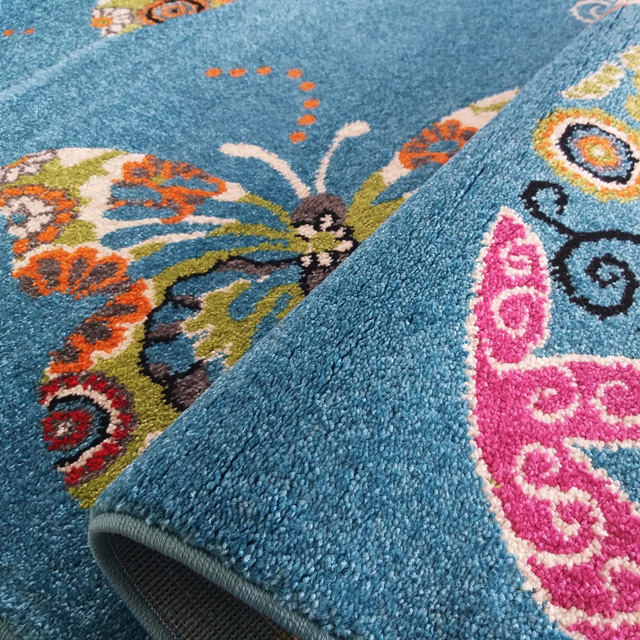 Niebieski dywan dziecięcy w motyle Dislo