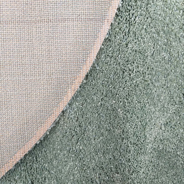 Okrągły dywan shaggy w kolorze miętowym Valto