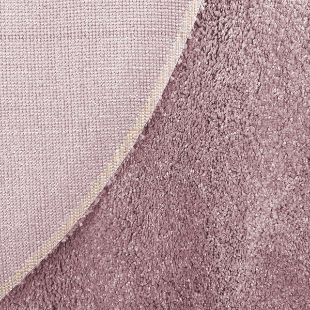 Okrągły różowy dywan typu shaggy Valto