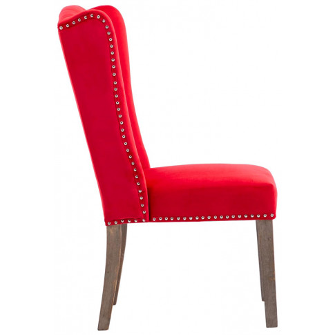 czerwone krzesło z kołatką zdobione nitami oksana