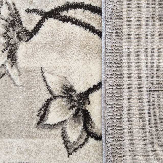 Szary nowoczesny dywan z motywem kwiatów Berko