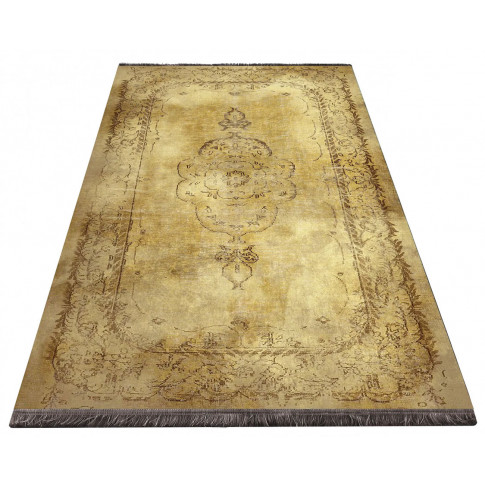 Złoty prostokątny dywan we wzory Bernes