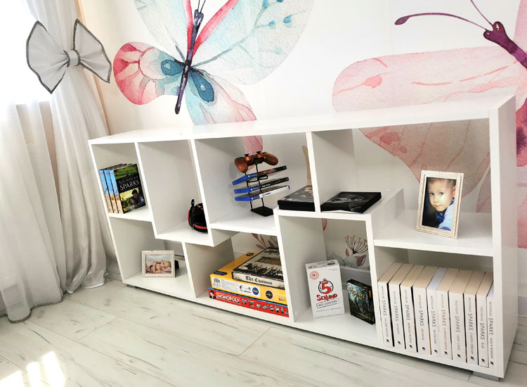 Designerski regał na książki do salonu Piwi