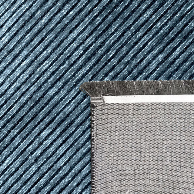 Niebieski dywan antypoślizgowy w stylu skandynawskim Avox