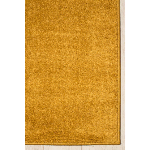 ciemnożółty dywan jednokolorowy minimalistyczny Kavo 3X