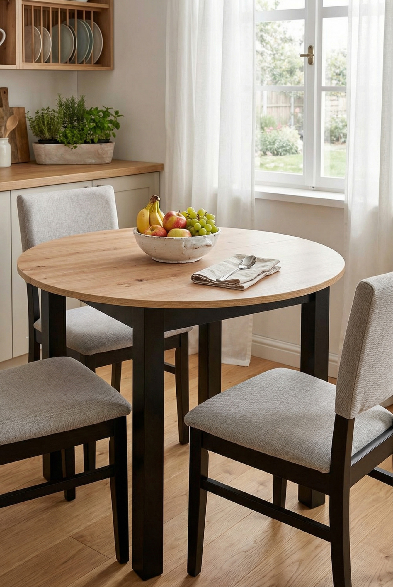 Kuchnia z wykorzystaniem okrągłego stołu rozkladanego Alenox artisan czarny