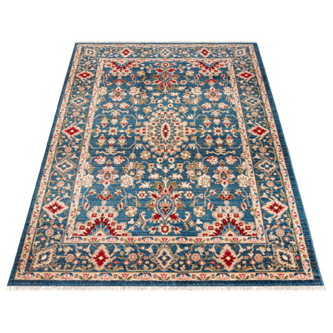 Niebieski wzorzysty dywan z frędzlami Iraz 7X