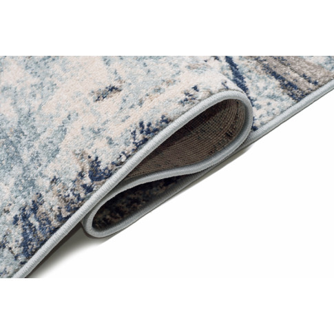 Niebieski wzorzysty dywan z frędzlami Bodi 3X