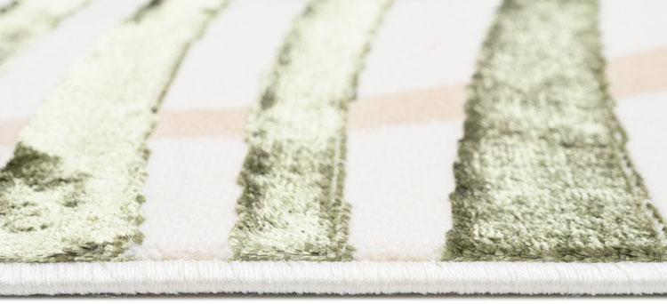 Kremowy dywan w ozdobne liście do salonu Oros 3X