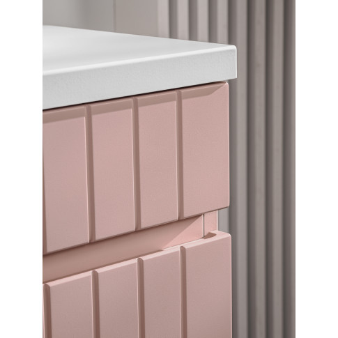 Frezowane fronty różowych szafek łazienkowych Dione