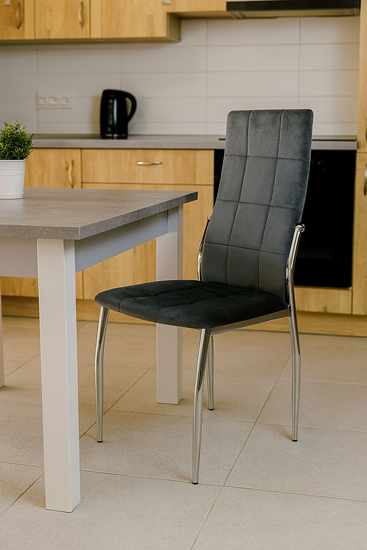 Szare tapicerowane krzesło z weluru 