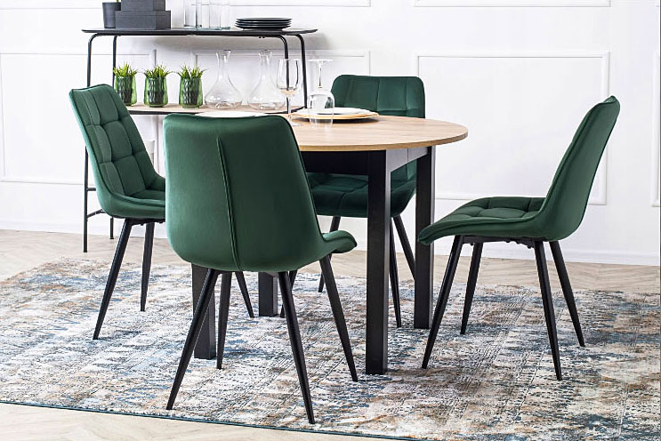 Rozkładany okrągły stół z zielonymi krzesłami Egri