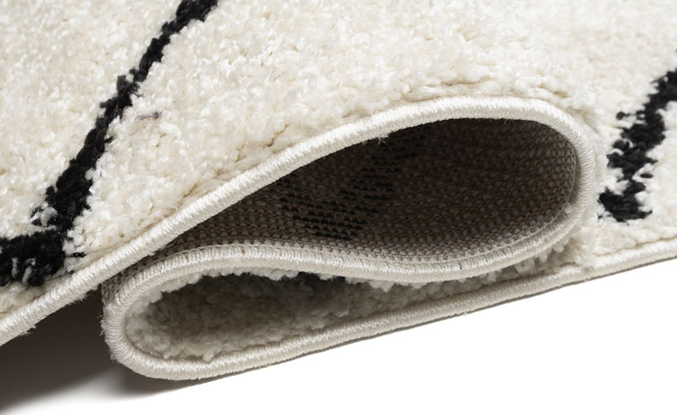 Chodnik dywanowy shaggy kremowy w czarne zygzaki Befi