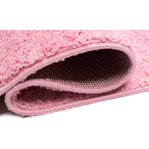 Różowy chodnik dywanowy shaggy gładki Ular