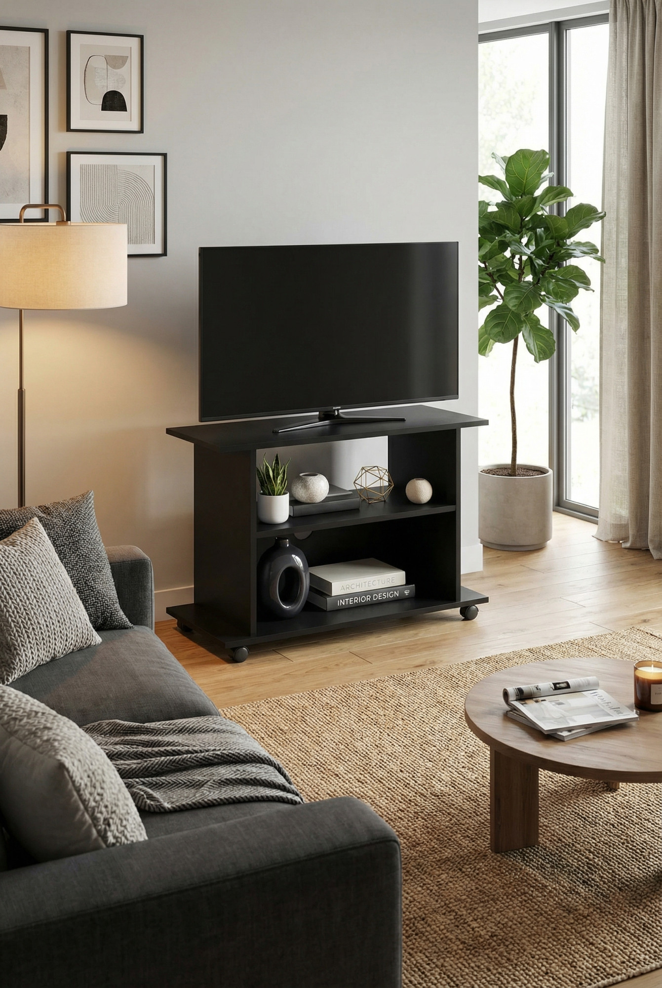 Nowoczesne wnętrze z czarną szafką pod TV Opiko