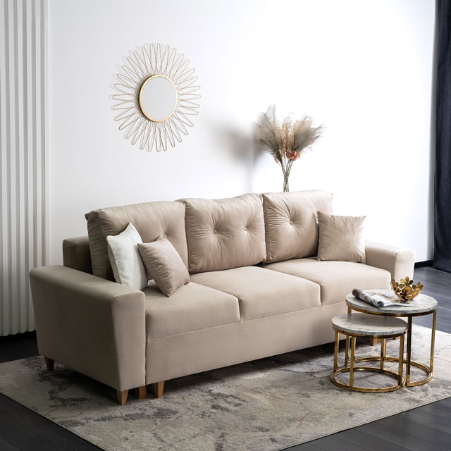 Beżowa welurowa sofa z funkcja spania Kanoni