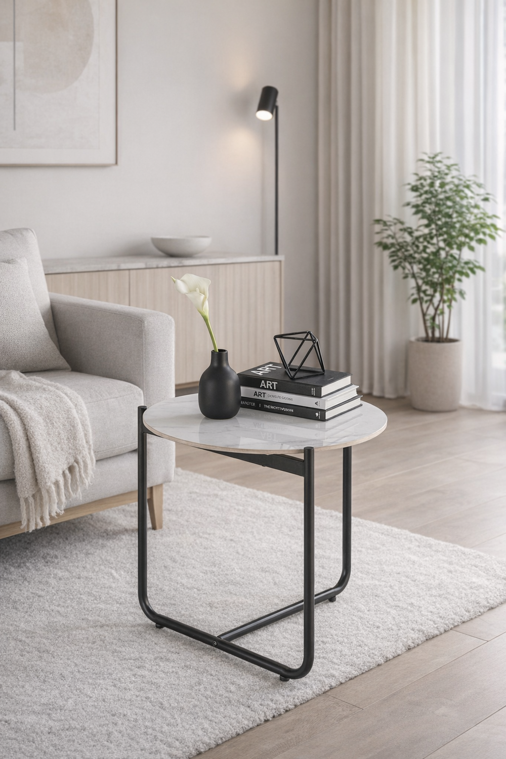 Salon z wykorzystaniem okrągłego stolika kawowego Afros 3X