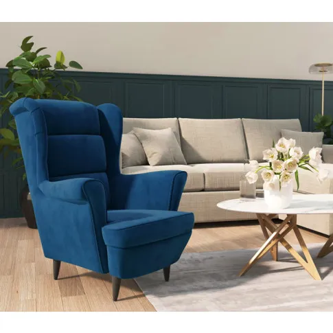 Niebieski fotel tapicerowany Donello