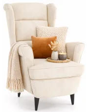 Kremowy welurowy fotel wypoczynkowy - Risten w sklepie Edinos.pl