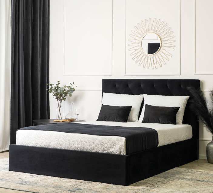 Czarne welurowe łóżko z pikowanym zagłówkiem Zenvio