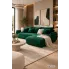 Zielona sofa narożna Ikto w nowoczesnym salonie