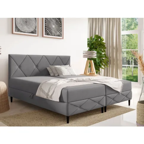 Sypialnia z szarym łóżkiem Riessa