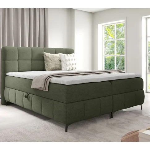 Aranżacja wnętrza z zielonym łóżkiem Ravesso