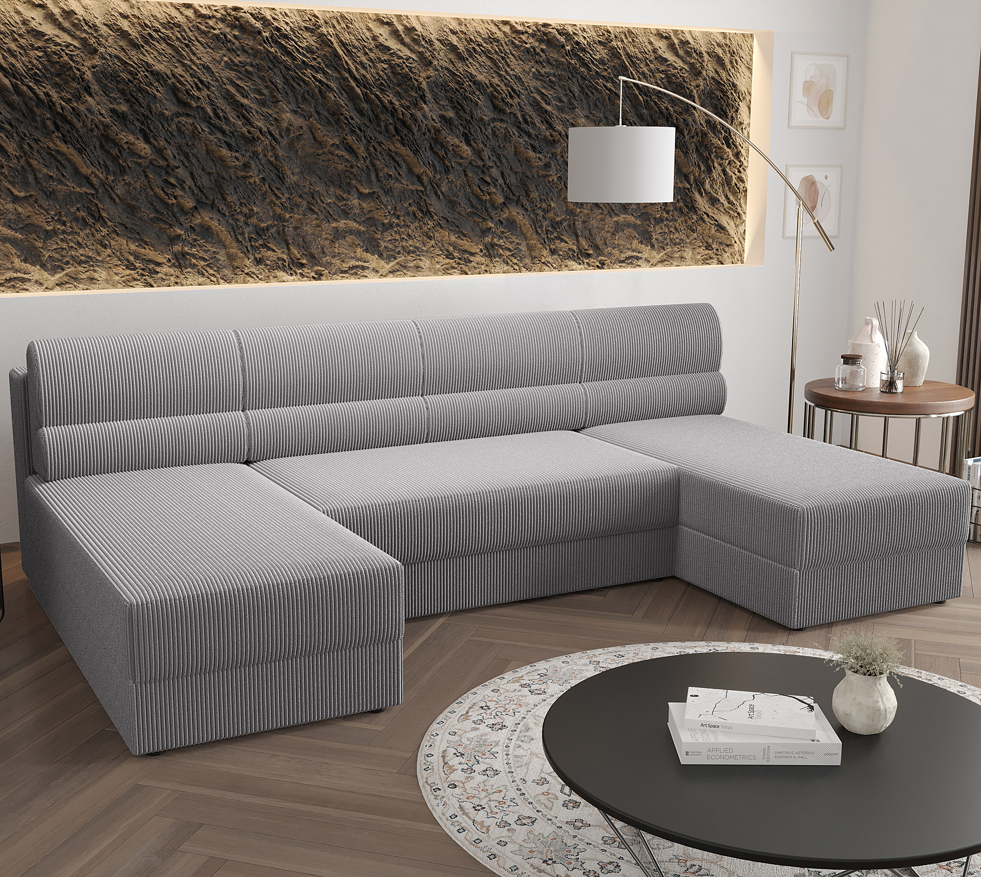 Aranżacja wnętrza z szarą sofą narożną Torvesso