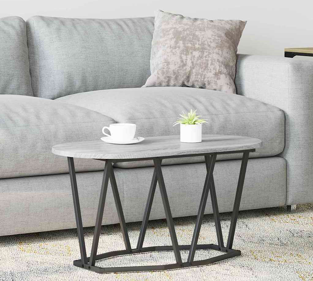 Salon z wykorzystaniem szarego owalnego stolika kawowego Ebin