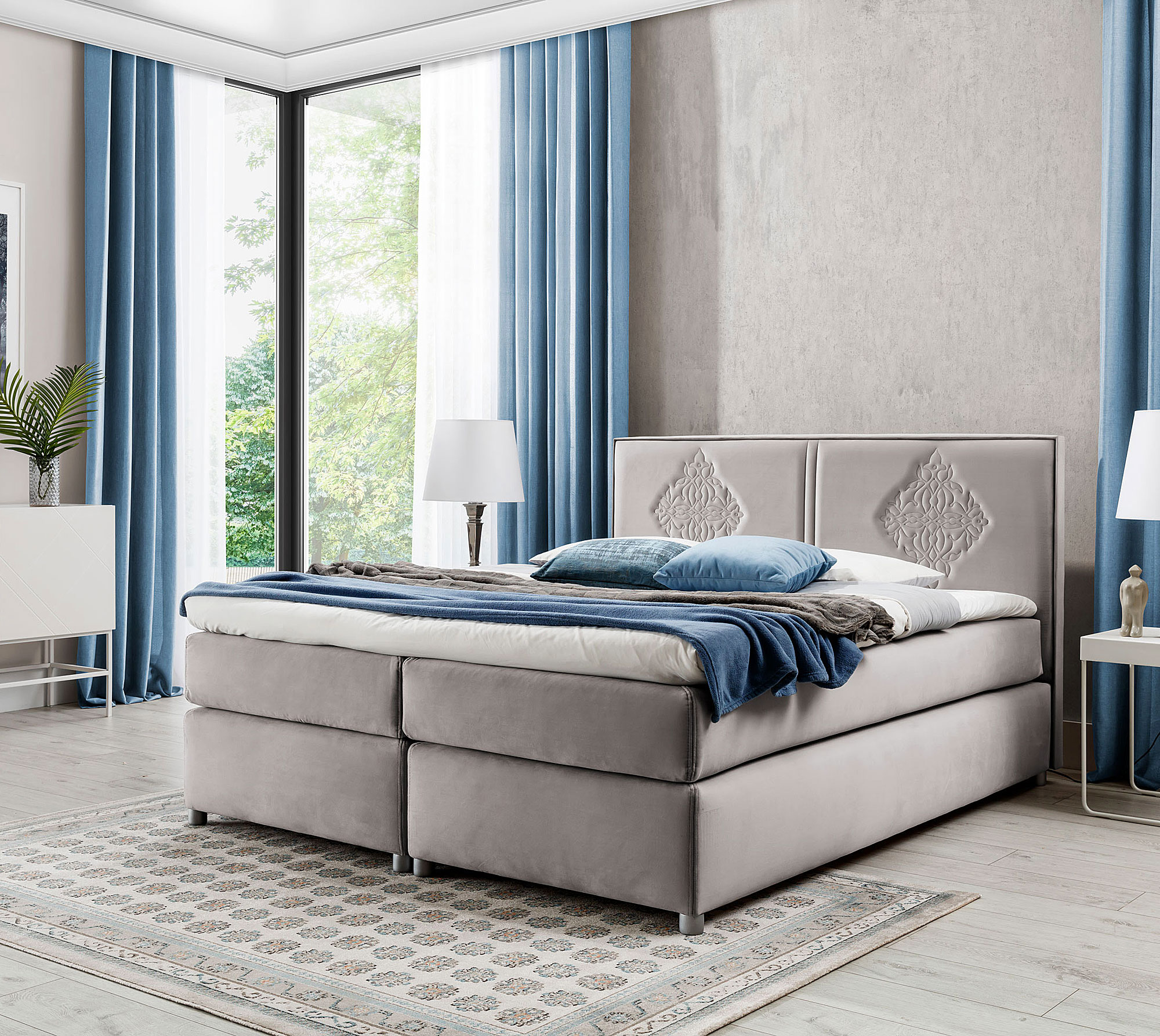 Aranżacja sypialni z jasnoszarym łóżkiem kontynentalnym Folvenna