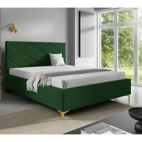 Aranżacja sypialni z zielonym łóżkiem Tollviano