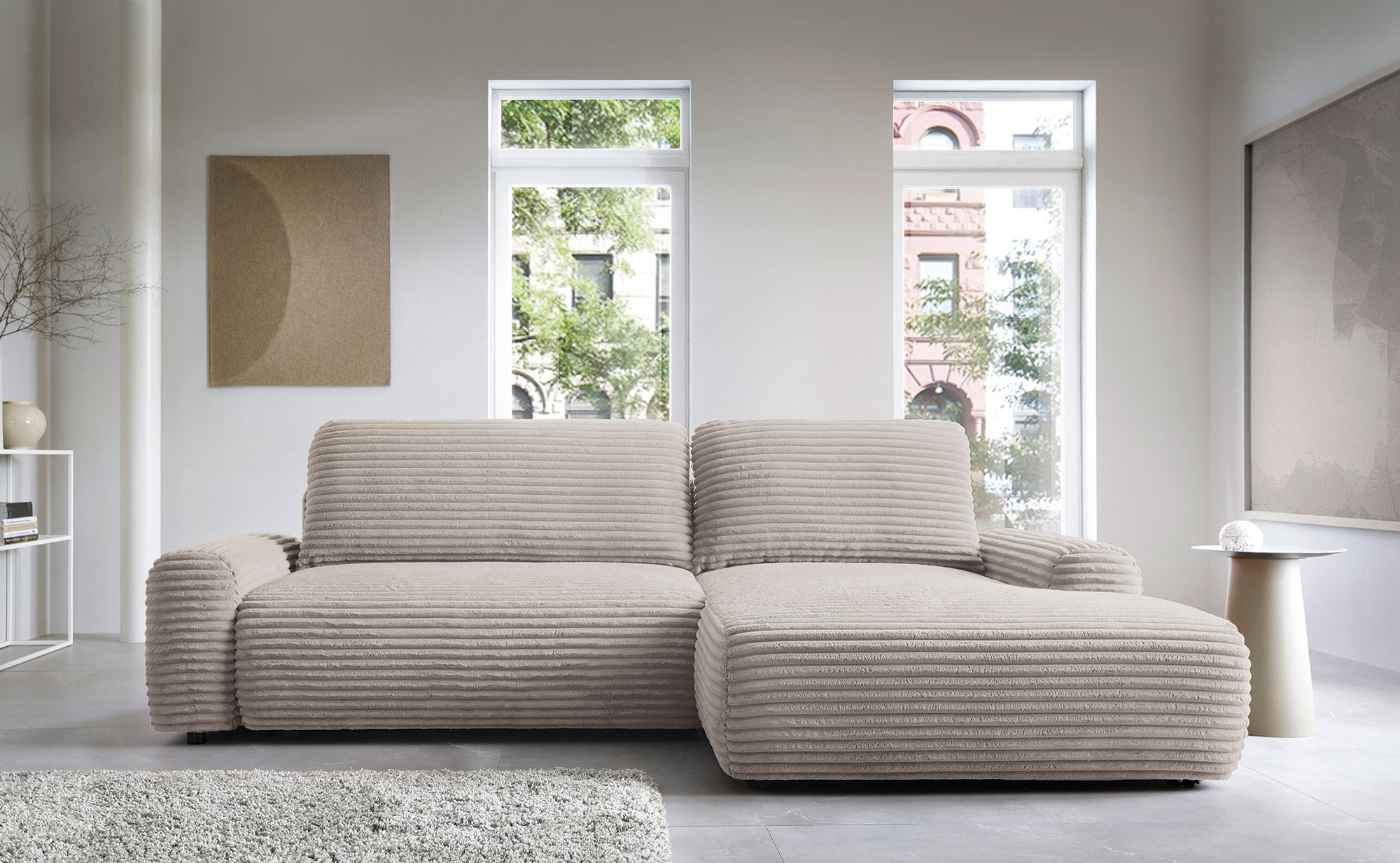 Przykładowa aranżacja wnętrza z wykorzystaniem brązowego narożnika Obelis taupe