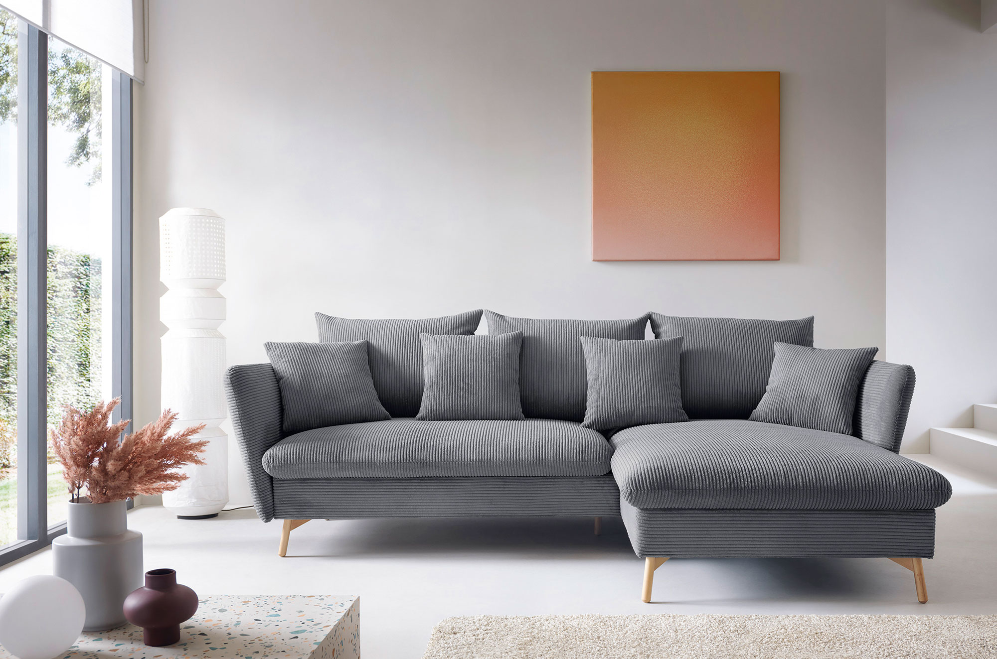 Wnętrze nowoczesne z wykorzystaniem sztruksowego narożnika Vettio stalowy