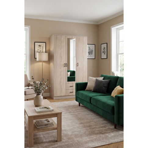 Aranżacja salonu z szafą w kolorze kaszmir dąb sonoma Montixa.jpeg