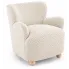 Kremowy fotel boucle w stylu skandynawskim Nobo