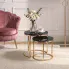 Salon z zestawem czarnych stolikow kawowych Tegini