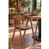 Eleganckie krzeło Erti orzech w restauracji