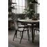 Fotografia Białe designerskie krzesło z czarnymi nogami tulipan - Mallon z kategorii Krzesła do salonu