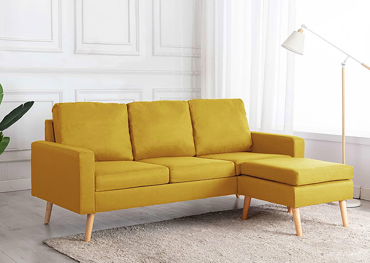 Żółta sofa z podnóżkiem Eroa 4Q